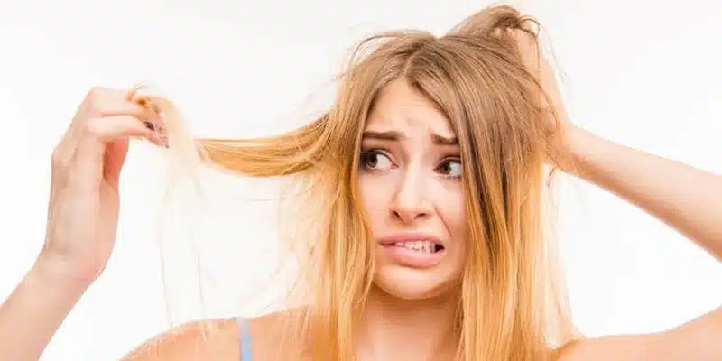 woman disgusted with hair